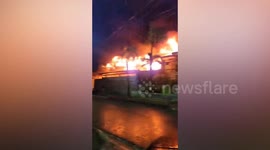 Fifteen dead in factory blaze amid heavy rain in the Philippines