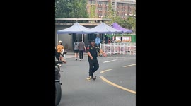Security guard escorts ducklings to safety at Chinese university