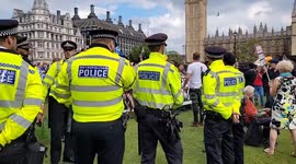 Police separate pro and anti abortion groups facing off outside Parliament