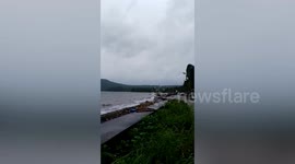 Typhoon Haikui churns up Taal Volcano lake as it amplifies monsoon rains in the Philippines