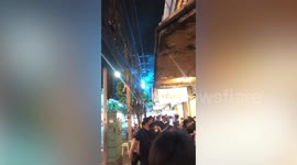 Electricity post explodes and lights up street in Bangkok