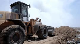 Firefighters control fire at main waste dump in Palestine