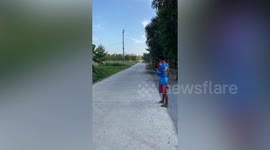 Local falls into ditch while riding modified motorised bicyle