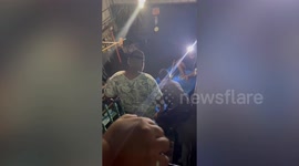 Chubby boy falls into floodwater while trying to ride rescue boat