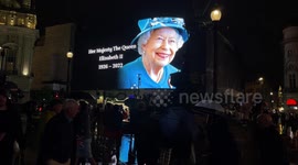 Archival: Giant tribute to Her Majesty The Queen Elizabeth II lights up Piccadilly Circus in London