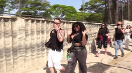 Fans line up at the entrance to The Town, in Sao Paulo, Brazil