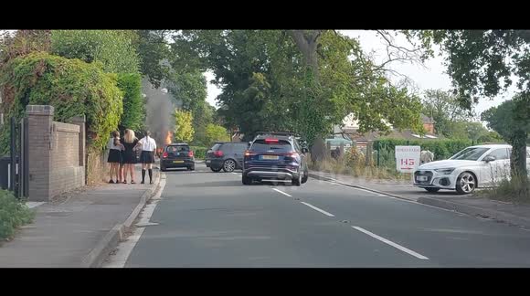 Car  on fire in Reading Road, RG40 on the A327 near Horns Farm causing  traffic chaos