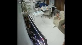 Kid Falls Off Recliner While Trying To Catch Twin