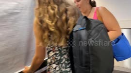 Marks & Spencer makes customers peek behind the shutters of fridges to keep the cold in