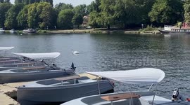 People enjoy the September sun in Kingston, UK