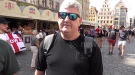England fans in Wroclaw, Poland discuss ongoing match against Ukraine