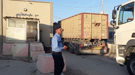 Palestinian police officers walk at the commercial crossing of Kerem Shalom, as Israel ends a ban on exports from Gaza, in Rafah in the southern Gaza Strip