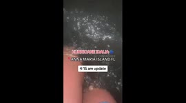 Woman SWIMS through flooded street after hurricane Idalia hits Florida Part 3/5