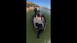 Guys Falls in Lake Trying to Save Water Bottle Lid