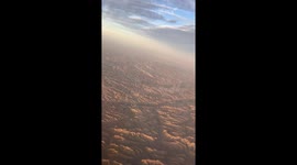 Breathtaking view captivates plane passengers flying over landscape in northwestern China