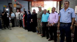 Palestinians participate in a solidarity event with the Moroccan people