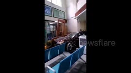 Car ploughs into hospital lobby, injuring 2 in China