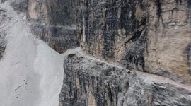 Nerve-shredding scenes as daredevil British mountain biker takes on Italy mountains