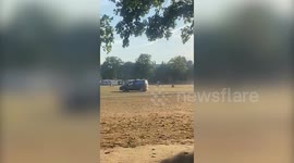 Video shows van weaving through traveller camp on Richmond Green as police sirens are heard