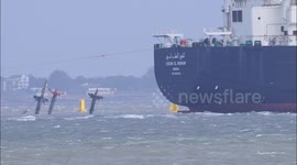 Tugs assist Gas ship depart in strong winds off Kent, UK