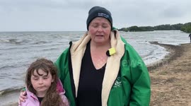 Environmentalists hold ‘wake’ for Lough Neagh over toxic algae bloom in Londonberry, UK
