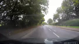 Motorbike gang pull off wheelies on busy road in Manchester