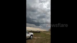 Menacing landspout swirls close to brave filmer in Kansas