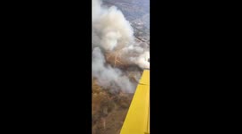 Aerial view: firefighter's perspective on wildfires in Córdoba, Argentina
