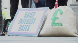 Protesters gather outside Bank of England amid another interest rate hike in London, UK