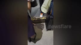 Woman helps father rescue young son who fell into gap between train and platform