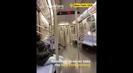 New York City Rat crawls over a sleeping man on subway
