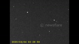 Nightvision capture of three satellites having a near collision .With a fast flying creature that gets caught up in the frame.