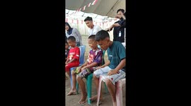 Schoolboys have hilarious game with elastic bands around their noses