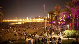 Crowds on barcelona beach during la merce festival