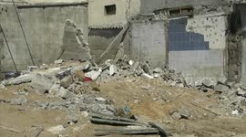 Palestinian workers remove the old shops in the popular Firas market in Gaza city.