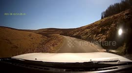 Driver Collides with Cyclist on Narrow Road