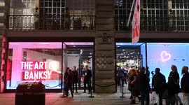 The Art Of Banksy on Regents Street was distributing balloons