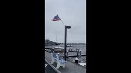 Windy day by the sea: strong winds and swaying boats in Pine Beach, New Jersey