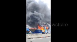 Huge fire engulfs hundred-ton fishing boat in southern China