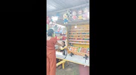 Sharp-shooting woman takes out entire row at fairground pistol game