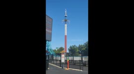 Riders Stuck In The Sky At Amusement Park