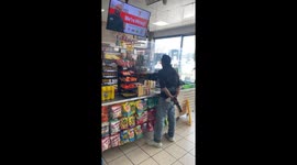 Guy stealing wine from 7/11 (part 2)