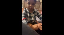 Two year old drops her 'baby' off with her mom while she runs errands