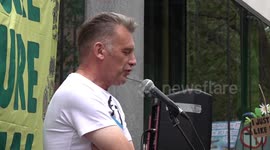 Chris Packham addresses protesters outside Defra in London, UK