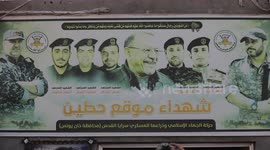 Masked members of the Al-Quds Brigades participate in a military parade in Gaza, Palestine