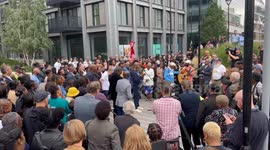 People gather for stabbing victim