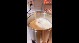 Woman makes gigantic, jaw-dropping Flower Candle from scratch for her mom's birthday