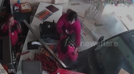 Car crashes into burger shop, injuring six people