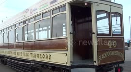 Box car tram.in service on blackpool promenade