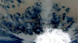 Clouds at sunset video effect 'negative'